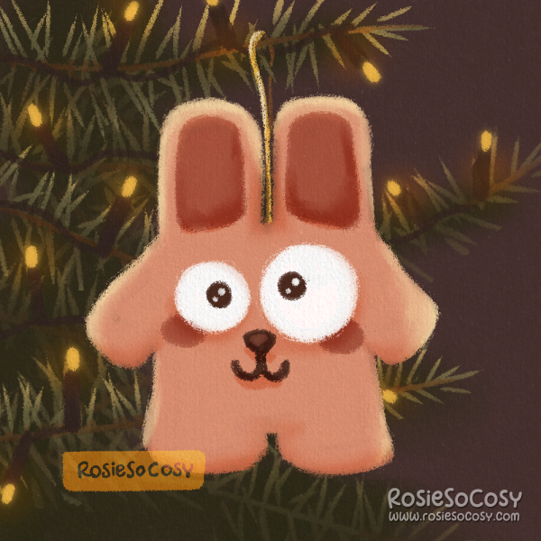 Illustration of a Freezer Bunny ornament in a Christmas tree. It is a pink bunny with wonky eyes. It’s surrounded by yellow twinkling lights.